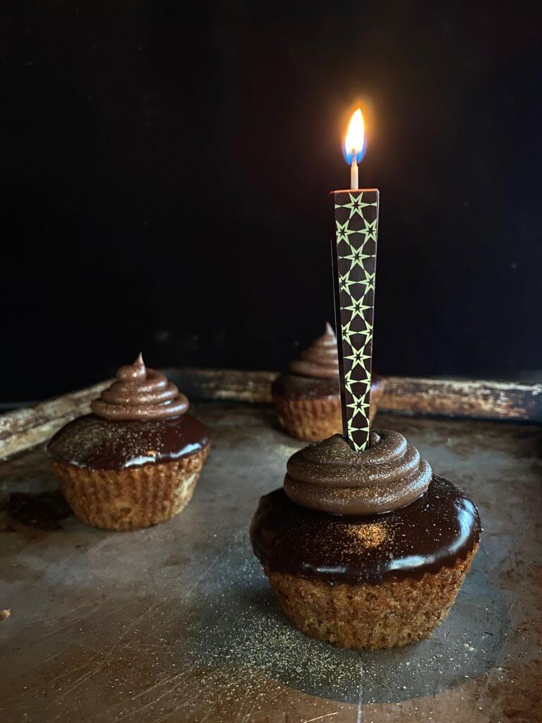 Edible Dark Chocolate Candle with stars on chocolate cupcakes | Let Them Eat Candles