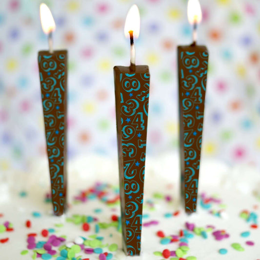 Edible Milk Chocolate Candles with blue numbers/stars on cake with sprinkles | Let Them Eat Candles