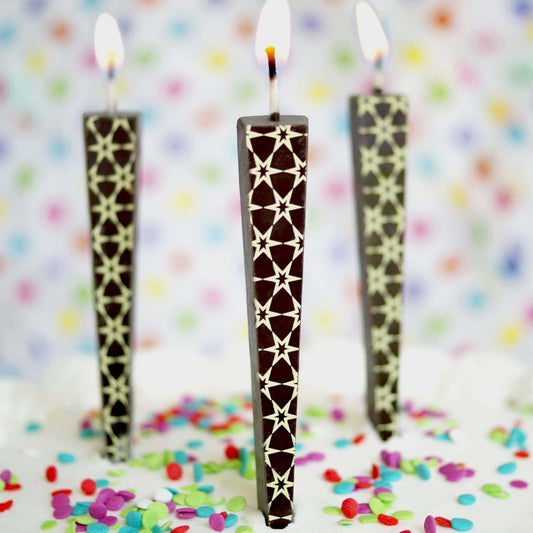 Edible Dark Chocolate Candles with Stars on cake with sprinkles | Let Them Eat Candles