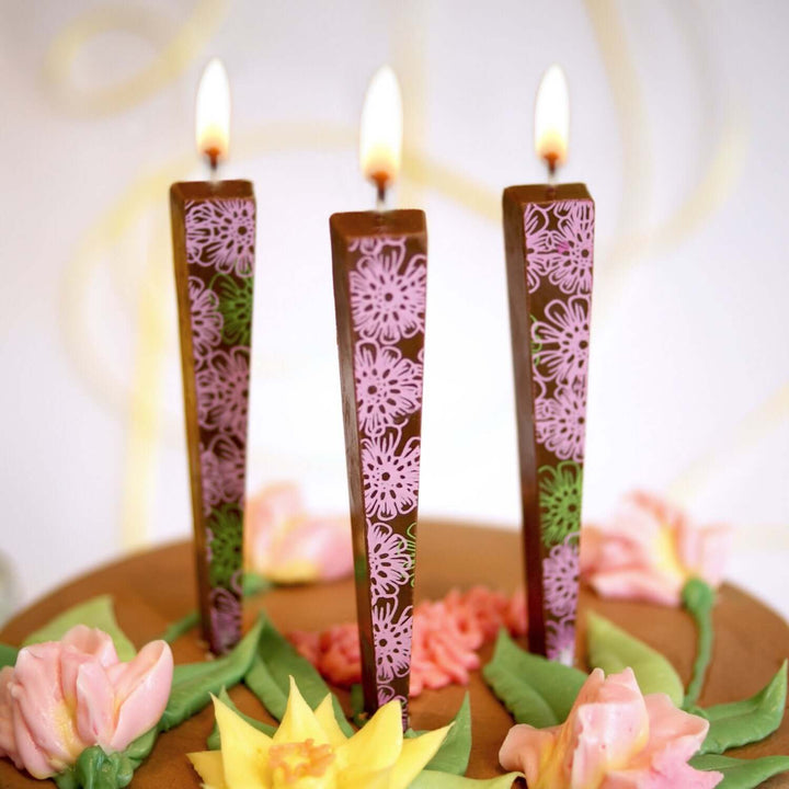 Edible Milk Chocolate Candles with Pink/Green Flowers in frosted cake | Let Them Eat Candles