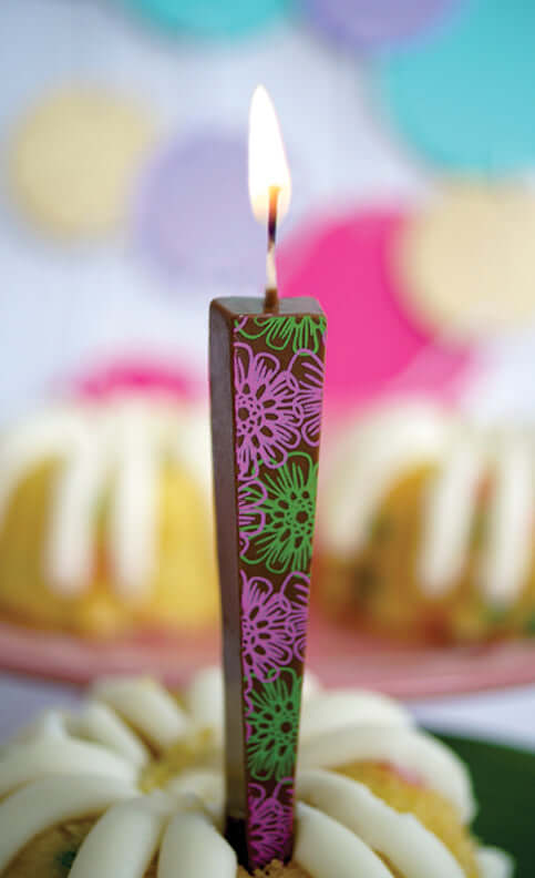 Edible Milk Chocolate Candle with Pink/Green Flowers in mini bundt cake | Let Them Eat Candles